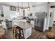 Modern kitchen with stainless steel appliances, granite countertops, and ample storage at 5016 Old Pine Ln, Cherryville, NC 28021