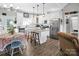 Stylish kitchen with white cabinets, stainless appliances, and an island with barstool seating at 5016 Old Pine Ln, Cherryville, NC 28021