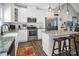 Modern kitchen with granite counters, stainless steel appliances, and bright white cabinetry at 5016 Old Pine Ln, Cherryville, NC 28021