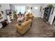 Inviting living room boasts natural light, hardwood floors, and comfortable seating at 5016 Old Pine Ln, Cherryville, NC 28021
