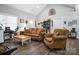 Relaxing living room with comfortable seating, stylish decor, and a warm, inviting atmosphere at 5016 Old Pine Ln, Cherryville, NC 28021