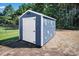 Outdoor shed with charming decorations and ample storage space for all your gardening tools and equipment at 5016 Old Pine Ln, Cherryville, NC 28021