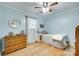 Bright bedroom with hardwood floors and large windows at 504 Amon Ln, Pineville, NC 28134