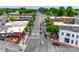 Aerial view of a bustling city street with shops, restaurants, and steady traffic flow at 504 Amon Ln, Pineville, NC 28134