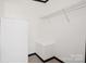 Walk-in closet with wire shelving and modern flooring at 6085 Faith Rd, Salisbury, NC 28146