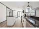 Well-lit kitchen featuring a large island and stainless steel appliances, perfect for cooking at 6085 Faith Rd, Salisbury, NC 28146