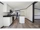 Modern kitchen featuring granite countertops, stainless appliances, and a center island at 6085 Faith Rd, Salisbury, NC 28146