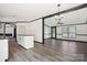 An open concept living space with an island dividing the kitchen and living room at 6085 Faith Rd, Salisbury, NC 28146