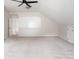 Spacious bonus room with white board, ideal for a home office, playroom, or creative space at 6400 Morningsong Ln, Charlotte, NC 28269