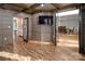 Spacious living room featuring hardwood floors and an open layout at 6400 Morningsong Ln, Charlotte, NC 28269
