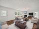 Inviting living room with cozy seating, a fireplace, and a view of the outdoors at 714 Helms Efird Rd, Marshville, NC 28103
