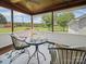 Relaxing porch with outdoor seating and a view of the lush green yard at 714 Helms Efird Rd, Marshville, NC 28103