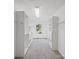 Spacious walk-in closet with built-in shelving, drawers, and a window for natural light at 714 Helms Efird Rd, Marshville, NC 28103