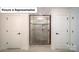 Modern bathroom features a glass shower with tile surround, dual access from opposing doors at 7184 Sylvan Retreat Dr, Denver, NC 28037