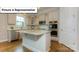 Modern kitchen with stainless steel appliances and a center island with granite countertops at 7196 Sylvan Retreat Dr, Denver, NC 28037
