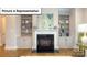 Inviting living room featuring a fireplace and built-in bookshelves for an elegant touch at 7196 Sylvan Retreat Dr, Denver, NC 28037