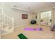 Finished basement featuring an exercise area, carpeted flooring, and bright lighting at 7356 Terrace Dr, Charlotte, NC 28211