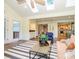 Inviting sunroom provides great views of the outdoors with kitchen access at 7356 Terrace Dr, Charlotte, NC 28211