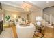 Bright living room with hardwood floors, fireplace, and natural light, offering a comfortable and stylish living space at 7356 Terrace Dr, Charlotte, NC 28211