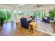 Open sunroom with patio access, ideal for entertaining guests at 7356 Terrace Dr, Charlotte, NC 28211