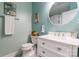Stylish bathroom featuring a modern vanity, oval mirror, and elegant decor at 85017 Newloch Ct, Lancaster, SC 29720