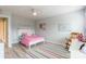 This cheerful bedroom has bright accents and light walls, creating a pleasant space at 85017 Newloch Ct, Lancaster, SC 29720