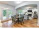 Charming dining area with hardwood floors, opens to a living room and includes outdoor access at 85017 Newloch Ct, Lancaster, SC 29720