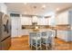 Bright kitchen with granite countertops, stainless steel appliances, and a central island with seating at 85017 Newloch Ct, Lancaster, SC 29720