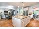 Open-concept kitchen features a large central island, granite countertops and stainless steel appliances at 85017 Newloch Ct, Lancaster, SC 29720