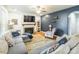Comfortable living room with a fireplace, built-in shelves, and stylish décor for a cozy gathering space at 85017 Newloch Ct, Lancaster, SC 29720