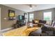 Modern living room with a large TV, comfy couch, and lots of space at 85017 Newloch Ct, Lancaster, SC 29720