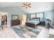 Lovely main bedroom featuring ensuite, wood floors, decor, and light walls at 85017 Newloch Ct, Lancaster, SC 29720