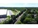 Expansive aerial view highlighting the property's proximity to transportation and green spaces at 921 W 1St St, Lowell, NC 28098