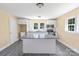 A kitchen with white cabinets and stainless steel appliances at 921 W 1St St, Lowell, NC 28098
