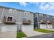 Modern townhomes with private balconies and garage parking, perfect for contemporary living at 1015 Maltby St, Charlotte, NC 28217