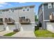 Exterior view of the property featuring driveways, garages and second story balconies at 1015 Maltby St, Charlotte, NC 28217