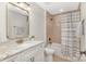 Elegant bathroom featuring granite countertops, white cabinets, and a shower-tub combination with a shower curtain at 102 Antioch Plantation Dr # 18, Matthews, NC 28104