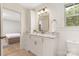 Charming bathroom with granite countertop vanity and direct access to bedroom, blending comfort and convenience at 102 Antioch Plantation Dr # 18, Matthews, NC 28104