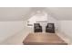 Cozy bonus room with comfortable seating and carpeted floors, ideal for relaxation or entertainment at 102 Antioch Plantation Dr # 18, Matthews, NC 28104