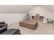 Attic bonus room featuring a modern table and chairs, perfect for a playroom or study area at 102 Antioch Plantation Dr # 18, Matthews, NC 28104