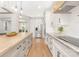 Spacious kitchen with stainless steel appliances, center island, and white cabinets at 102 Antioch Plantation Dr # 18, Matthews, NC 28104