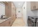 Laundry room showcasing modern appliances and custom cabinets at 102 Antioch Plantation Dr # 18, Matthews, NC 28104