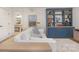 Inviting living room with built-in bookshelves and a cozy couch, great for relaxation and entertaining at 102 Antioch Plantation Dr # 18, Matthews, NC 28104