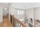 Open-concept living area with high ceilings, a fireplace, and stylish chandelier, creating a welcoming atmosphere at 102 Antioch Plantation Dr # 18, Matthews, NC 28104
