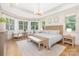 Serene main bedroom with natural light, neutral tones, and seating area at 102 Antioch Plantation Dr # 18, Matthews, NC 28104