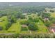 Sprawling wooded property with well-maintained home, outbuildings and private pond at 1081 Long Dr, Newton, NC 28658