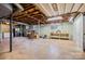 Unfinished basement with painted concrete block walls and exposed ceiling features at 1081 Long Dr, Newton, NC 28658