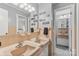 Charming bathroom featuring double vanity, tile walls, and a bright, airy feel at 1081 Long Dr, Newton, NC 28658