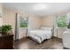 Charming bedroom featuring a white bed, matching furniture, and great natural lighting at 1081 Long Dr, Newton, NC 28658