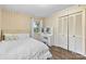 This bedroom is bright and inviting with natural light, soft bedding, and a lovely vanity at 1081 Long Dr, Newton, NC 28658